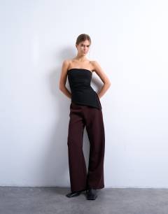 Model wearing Ruched waist asymmetric hem bandeau in black