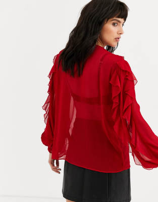 red ruffle blouse