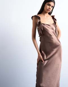 Model wearing Ruffle shoulder satin slip dress in chocolate
