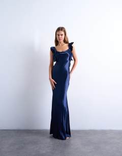 Model wearing Ruffle shoulder satin slip dress in navy