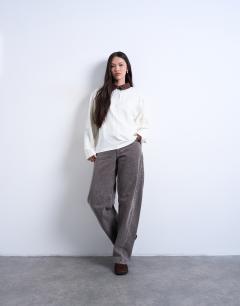 Model wearing Rugby long sleeve polo top in ecru