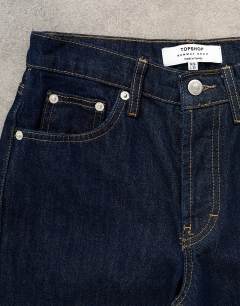 Model wearing Runway mid rise cropped jean in indigo rinse