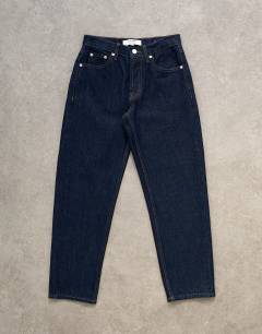Model wearing Runway mid rise cropped jean in indigo rinse