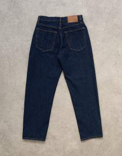 Model wearing Runway mid rise cropped jean in indigo rinse