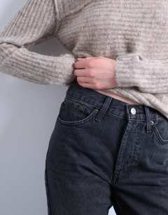 Model wearing Runway mid rise straight cropped jean in washed black