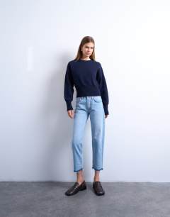Runway mid rise straight cropped jean with let down hem detail in bleach