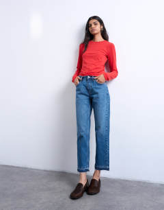 Runway mid rise straight cropped jean with let down hem detail in mid blue