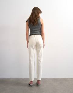 Model wearing Runway mid rise straight jean in bone