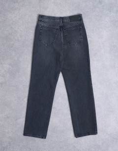 Model wearing Runway mid rise straight jean in washed black