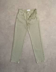 Model wearing Runway mid rise straight jean in washed khaki