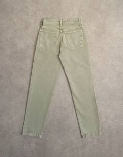 Model wearing Runway mid rise straight jean in washed khaki