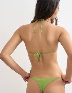 Model wearing Sadie triangle bikini top in green