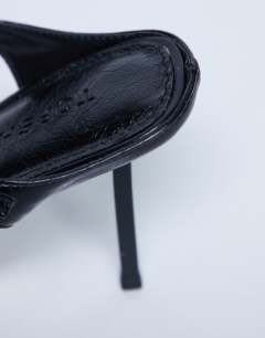 Model wearing Sally 2 part metal high heeled sandal in black
