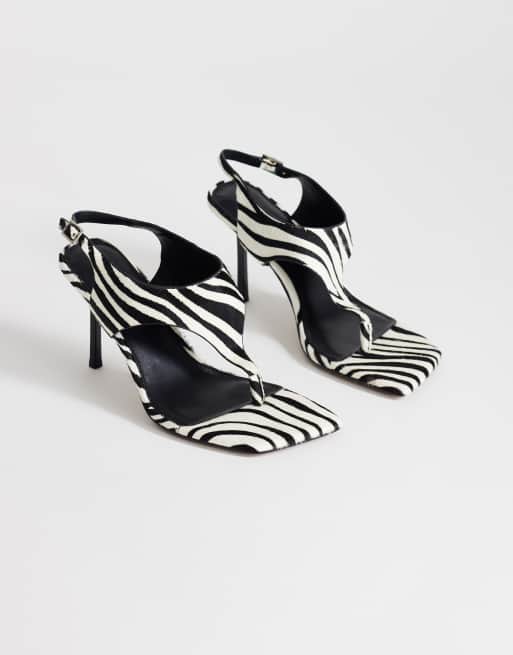 Topshop Sandy hair on real leather toe thong high heeled sandal in black  and white zebra | ASOS