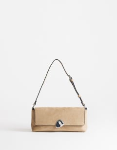 Model wearing Santiago small suedette shoulder bag with silver hardware in mink