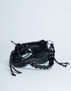 Model wearing Sarah whipstitch shoulder bag in black