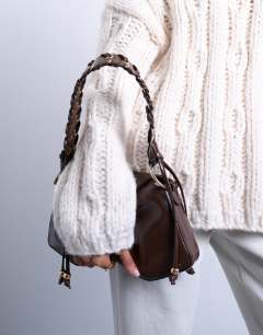 Model wearing Sarah whipstitch shoulder bag in chocolate