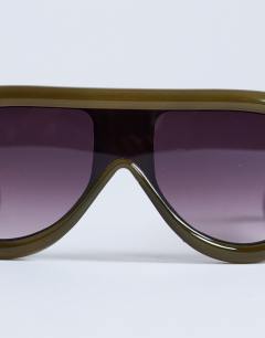 Model wearing Sardinia aviator sunglasses in khaki