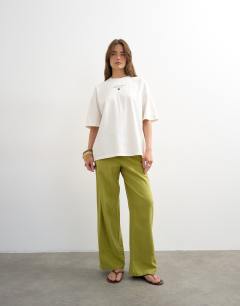 Model wearing Sardinia lemon graphic oversized tee in ecru