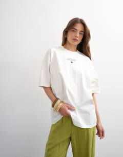 Model wearing Sardinia lemon graphic oversized tee in ecru