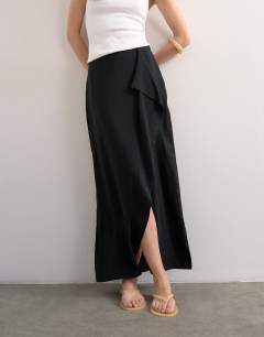 Model wearing Sarong wrap midi skirt in black