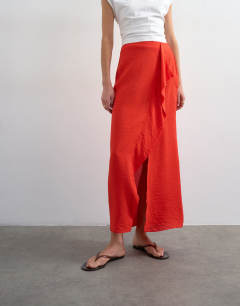 Model wearing Sarong wrap midi skirt in red