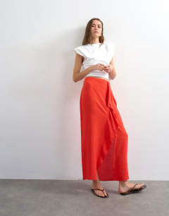 Model wearing Sarong wrap midi skirt in red