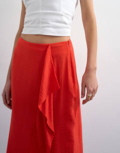 Model wearing Sarong wrap midi skirt in red