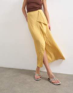 Model wearing Sarong wrap midi skirt in tan stripe