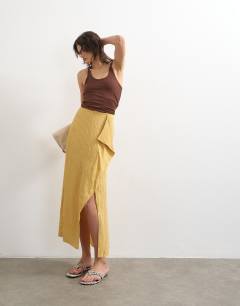 Model wearing Sarong wrap midi skirt in tan stripe