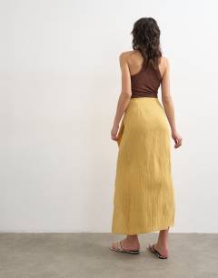 Model wearing Sarong wrap midi skirt in tan stripe