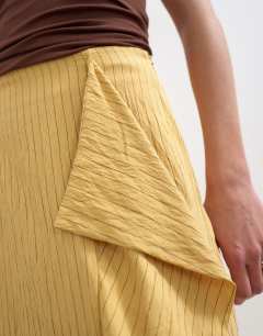 Model wearing Sarong wrap midi skirt in tan stripe