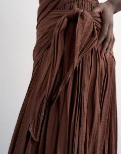 Model wearing Sash tie crinkle full maxi skirt in chocolate