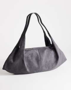 Model wearing Saskia large suedette shoulder bag in grey