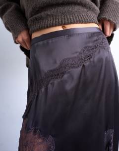 Model wearing Satin and lace mix hanky hem midi skirt in plum