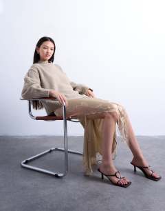 Model wearing Satin and lace mix hanky hem midi skirt in taupe