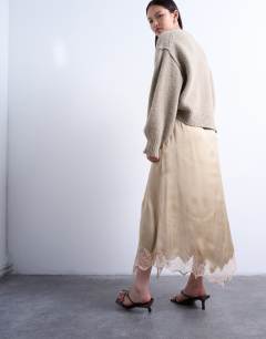 Model wearing Satin and lace mix hanky hem midi skirt in taupe