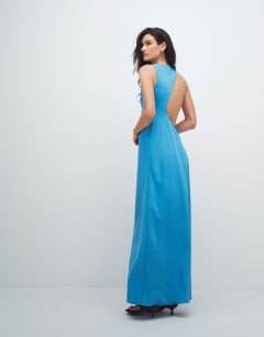 Model wearing Satin asym beaded neck maxi occasion dress in blue