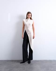 Satin asymmetric hem tunic top with shoulder pads in oyster