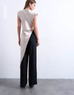 Model wearing Satin asymmetric hem tunic top with shoulder pads in oyster