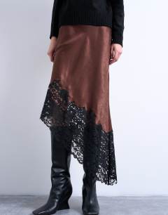 Model wearing Satin asymmetric lace hem midaxi skirt in brown with black lace 