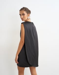 Model wearing Satin asymmetric pleat detail cape back mini dress in black