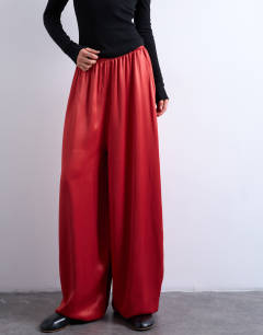 Model wearing Satin balloon trouser in red