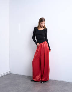 Model wearing Satin balloon trouser in red