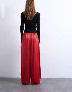 Model wearing Satin balloon trouser in red