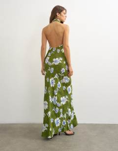 Model wearing Satin bias collapsed funnel halter neck maxi dress with open back in green floral