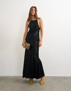 Model wearing Satin bias halter neck open scoop back maxi dress in black
