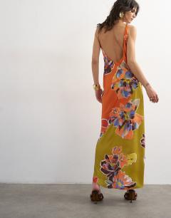Model wearing Satin bias halter neck open scoop back maxi dress in bold contrast floral