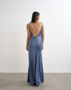 Model wearing Satin bias halter neck open scoop back maxi dress in denim blue