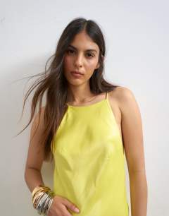 Model wearing Satin bias halter neck open scoop back maxi dress in lime